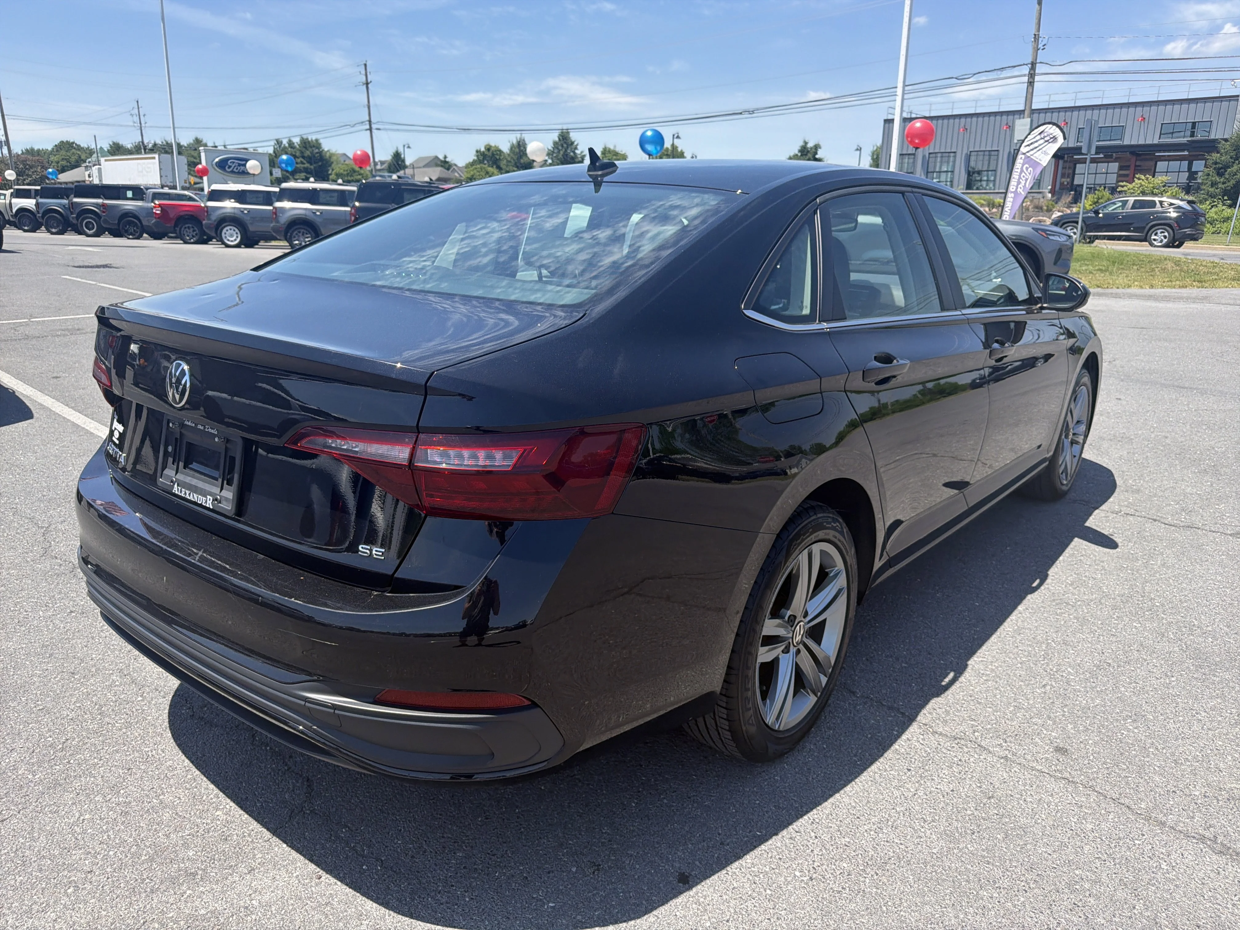 Used 2024 Black Volkswagen SE image 3