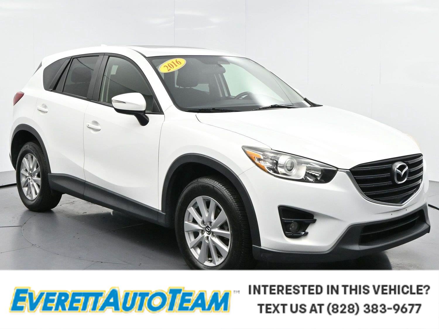Used 2016 Crystal White Pearl Mica Mazda Touring image 1
