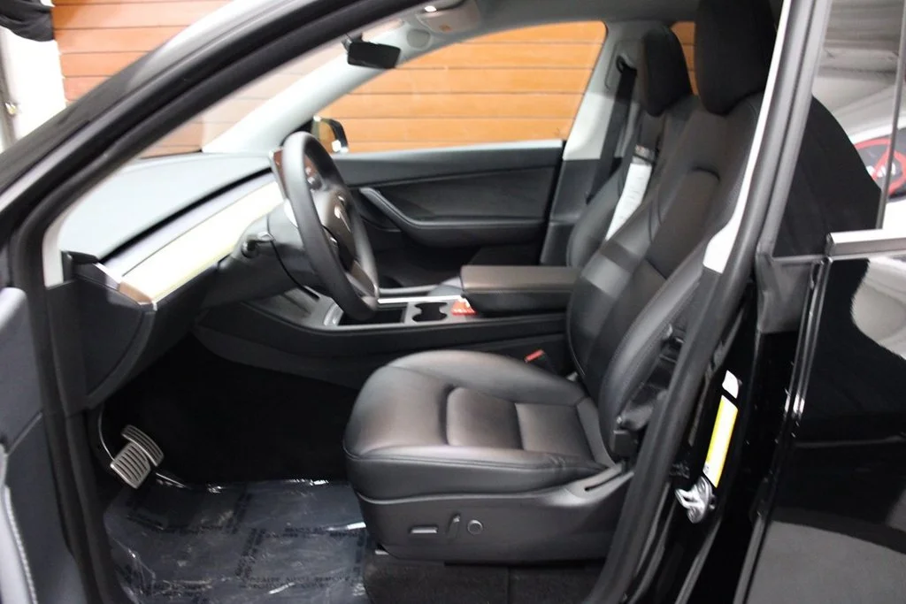 Used 2022 Solid Black Tesla Performance image 17