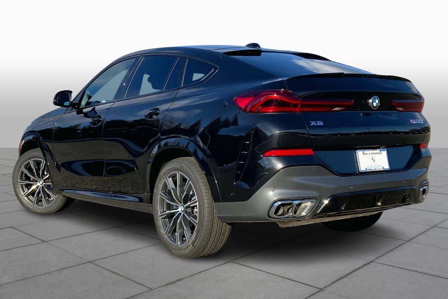 New 2026 Black Sapphire Metallic BMW M60i image 12