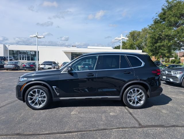 Certified Used 2026 Black Sapphire Metallic BMW xDrive40i image 1