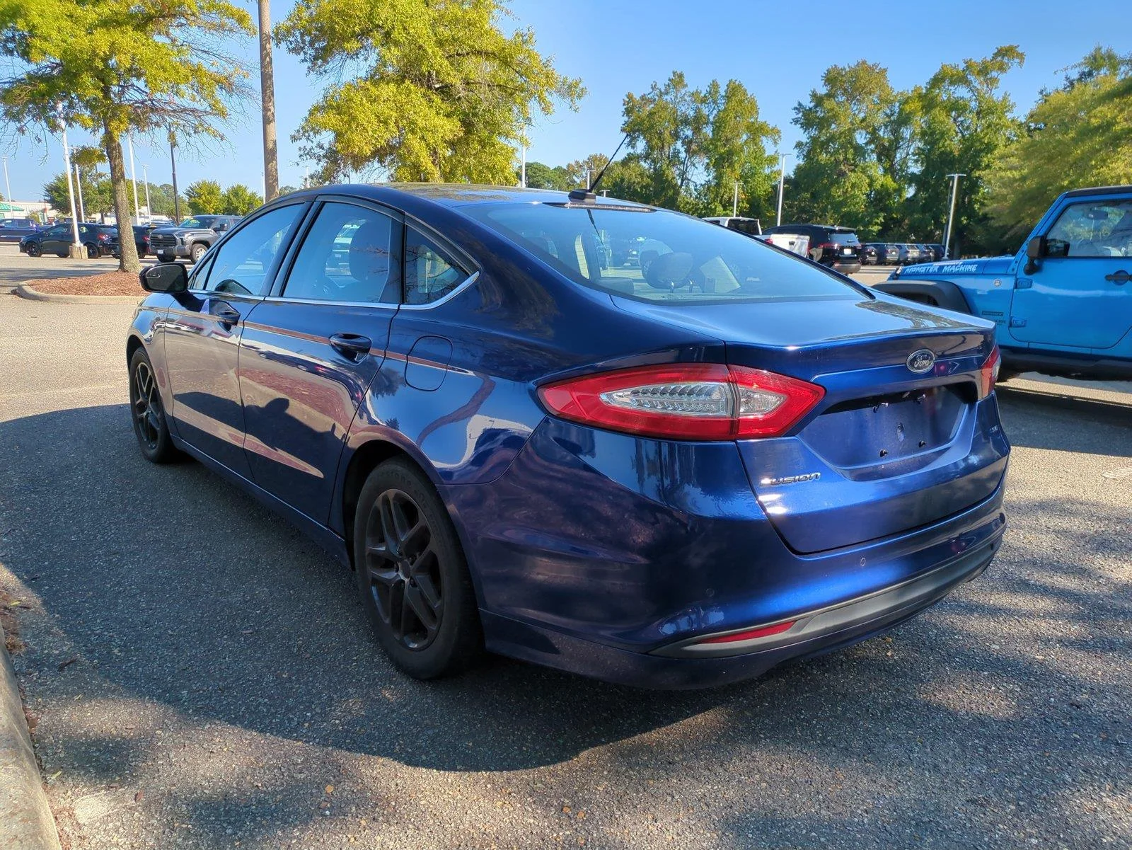 Used 2016 Deep Impact Blue Ford SE image 6