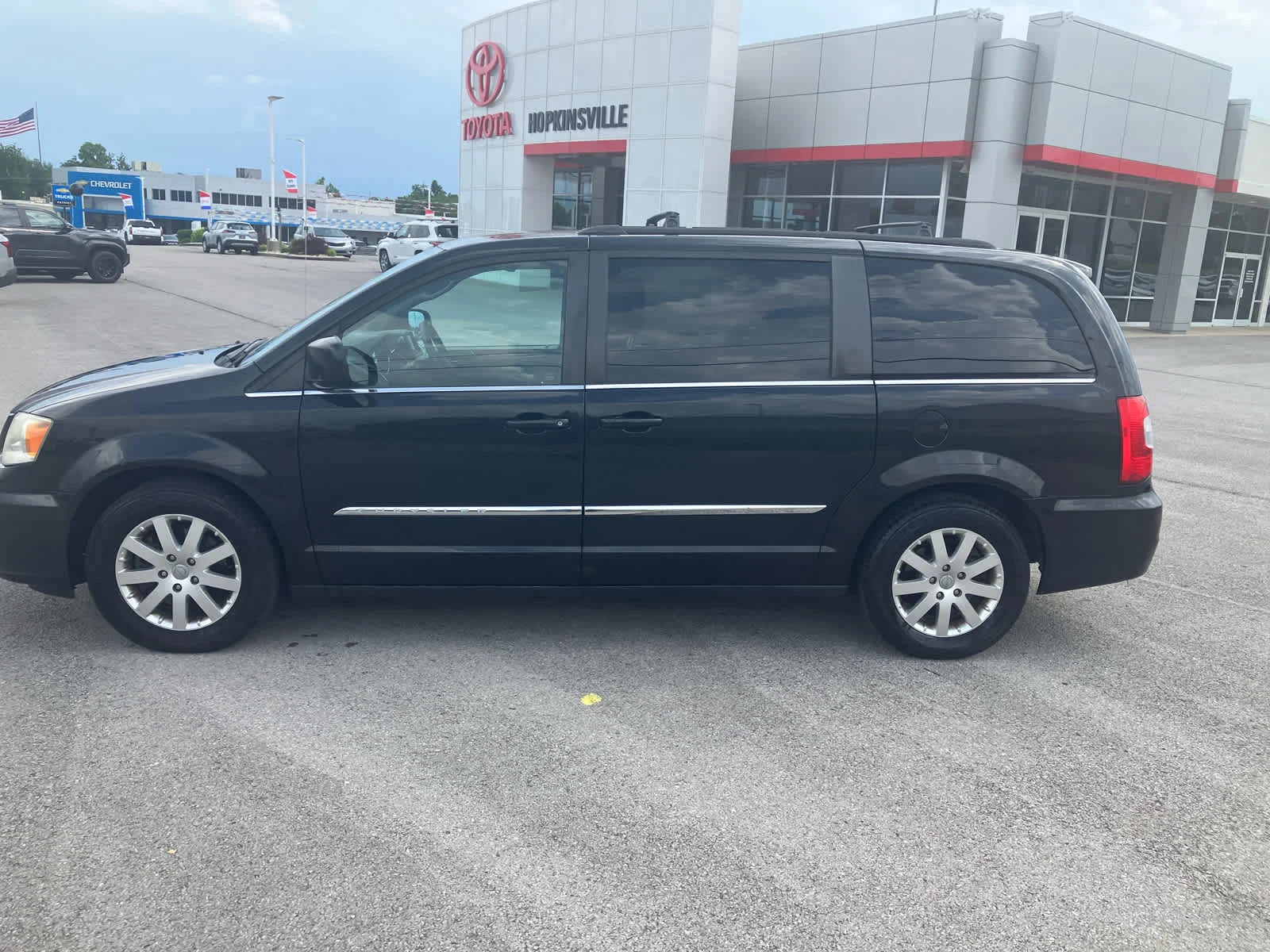 Used 2013 Brilliant Black Crystal Pearl Chrysler Touring image 4
