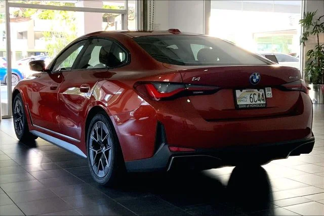 Used 2023 Sunset Orange Metallic BMW eDrive35 image 5