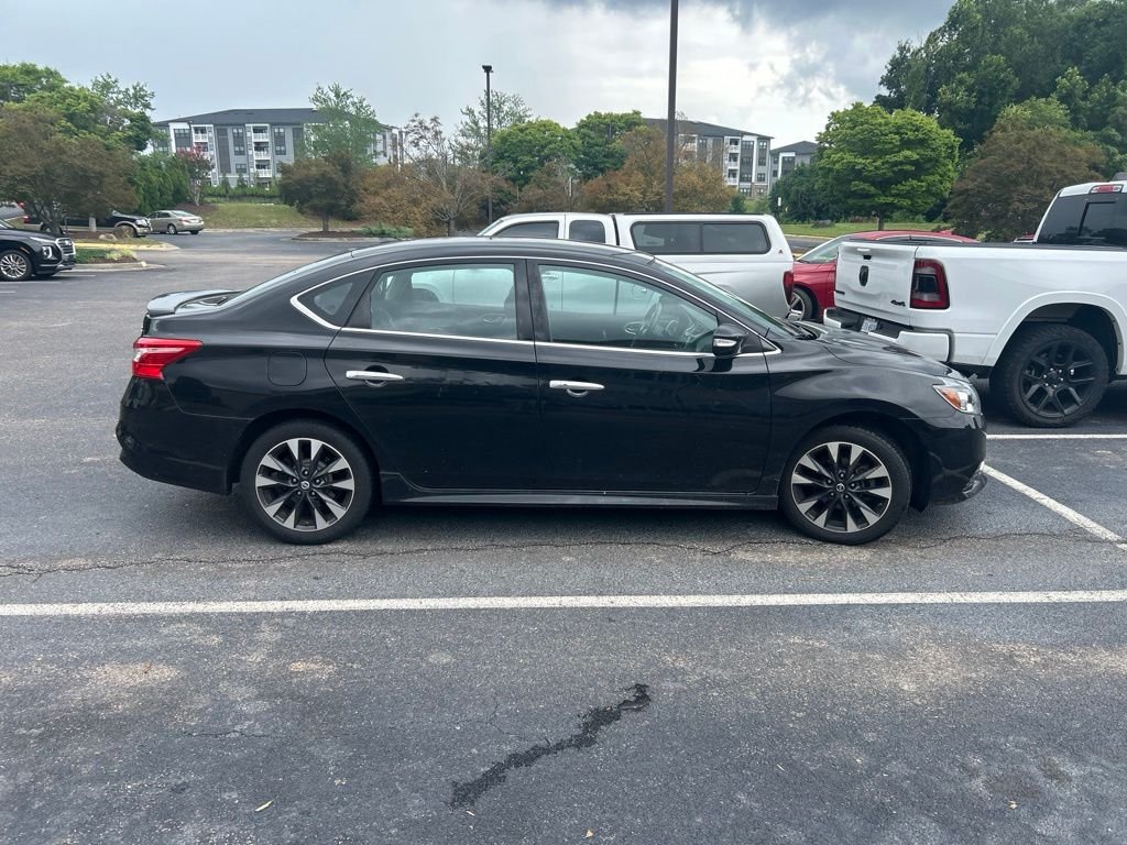 Used 2016 Black Nissan SR image 2