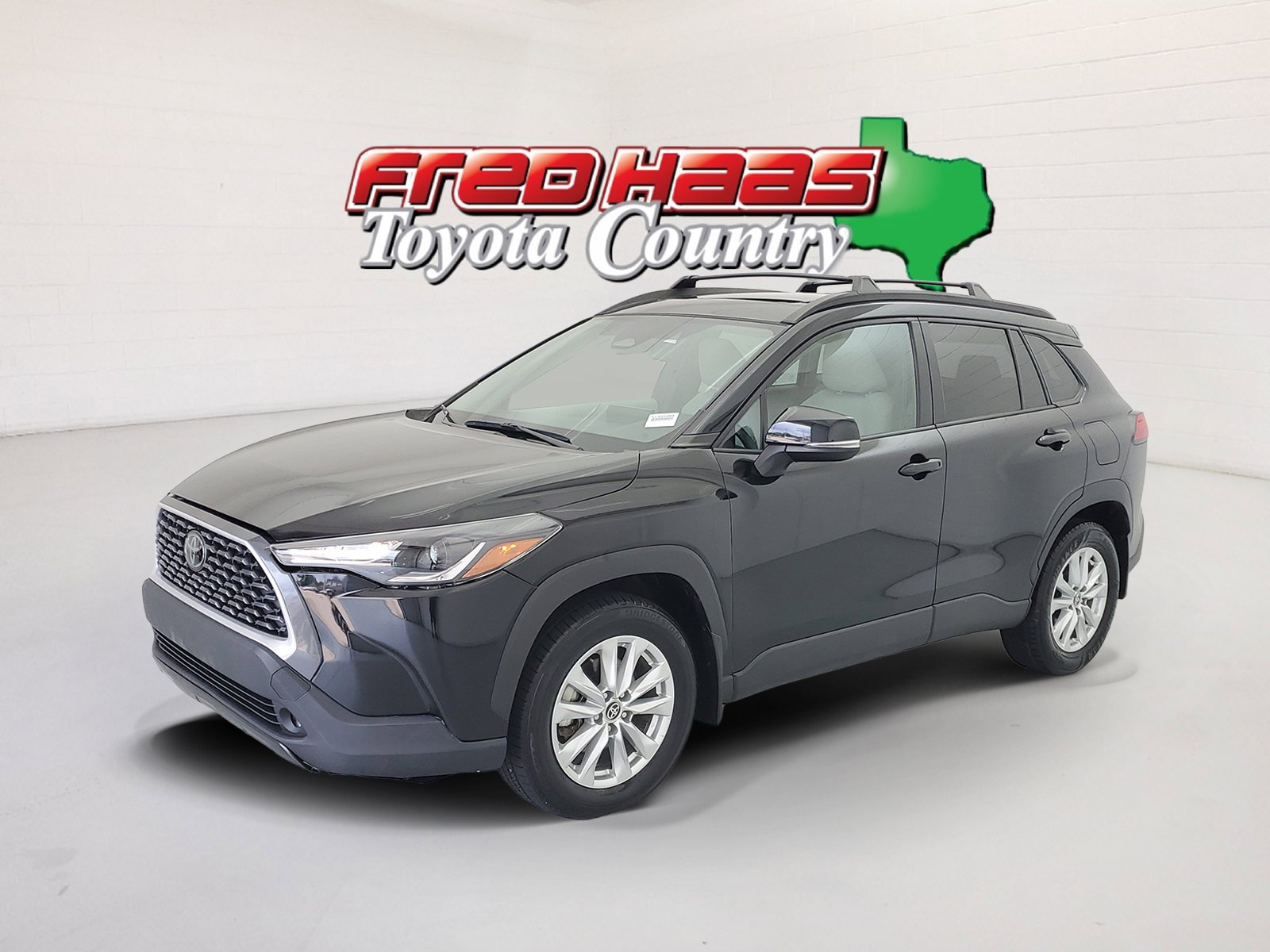 Used 2025 Jet Black Toyota LE image 1