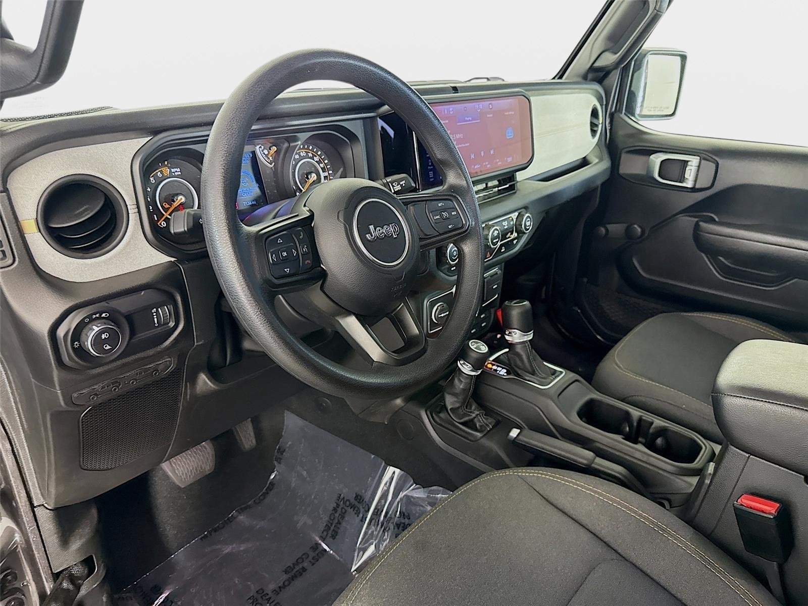 Used 2024 Granite Crystal Metallic Clearcoat Jeep Sport image 9
