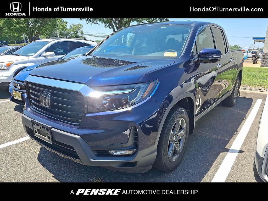 Certified Used 2023 Obsidian Blue Pearl Honda AWD RTL-E image 1