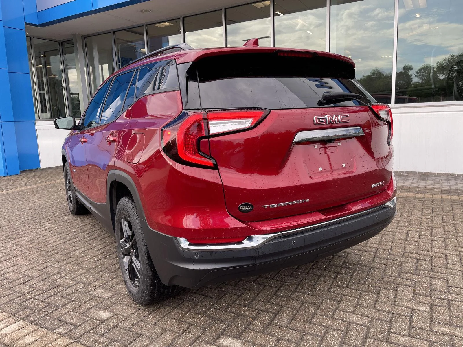 Used 2024 Volcanic Red Tintcoat GMC AT4 image 3
