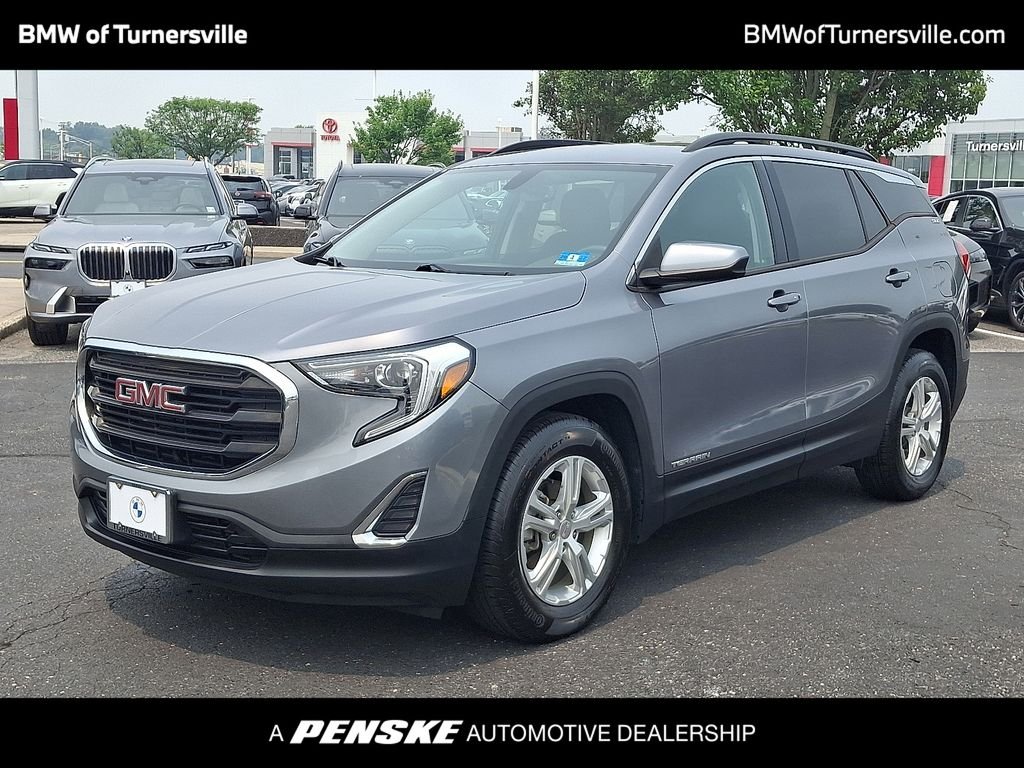 Used 2018 Steel Metallic GMC SLE image 1