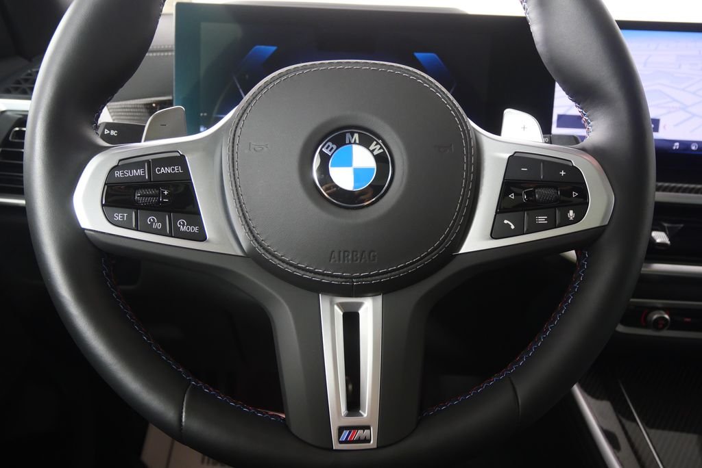 Certified Used 2026 Black Sapphire Metallic BMW M60i image 17