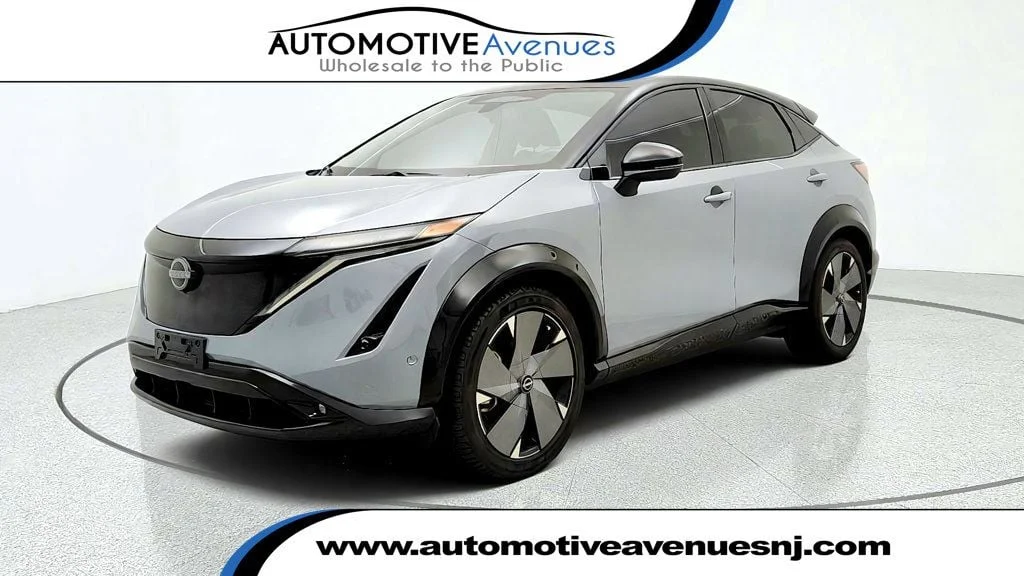 Used 2023 Boulder Gray Pearl Nissan PLATINUM+ e-4ORCE AWD w/20"" Wheels image 1
