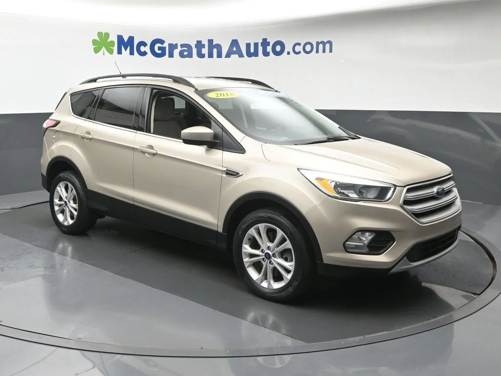 Used 2018 Ford Escape SE with VIN 1FMCU9GD5JUB53767 for sale in Marion, IA