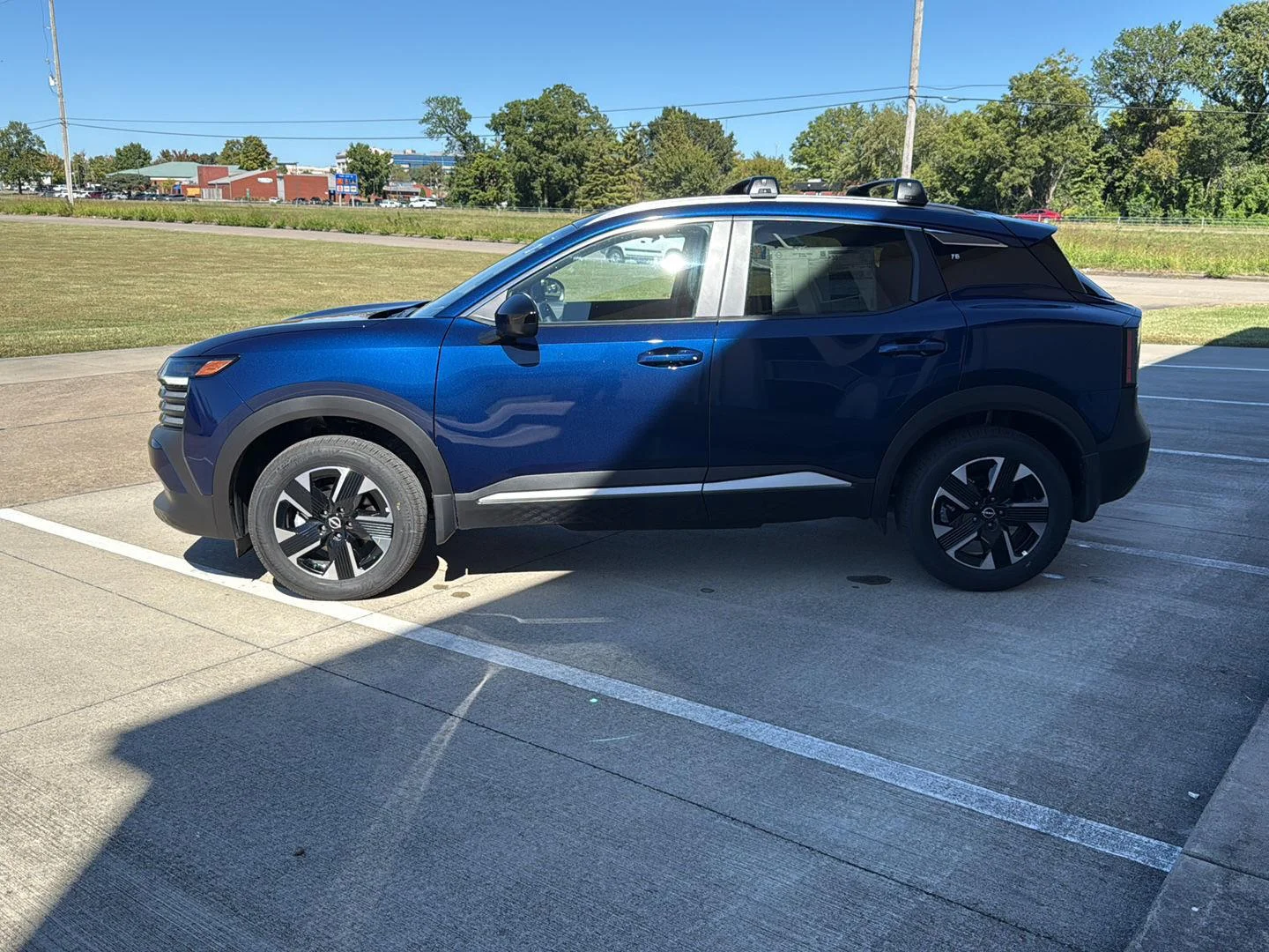 New 2027 Deep Blue Pearl Nissan SV image 4