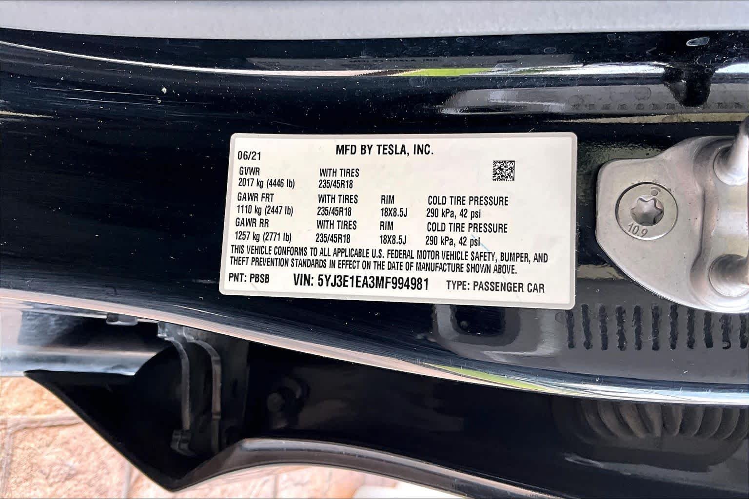Used 2021 Solid Black Tesla Standard Range Plus image 33
