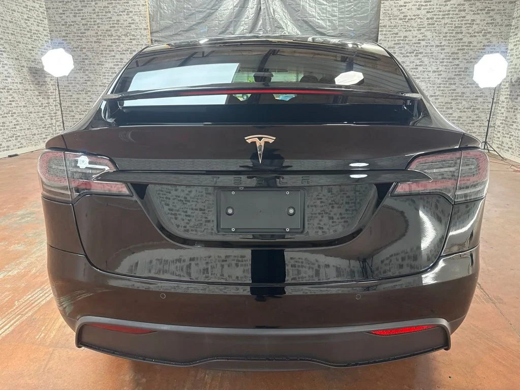 Used 2022 Solid Black Tesla Base image 6
