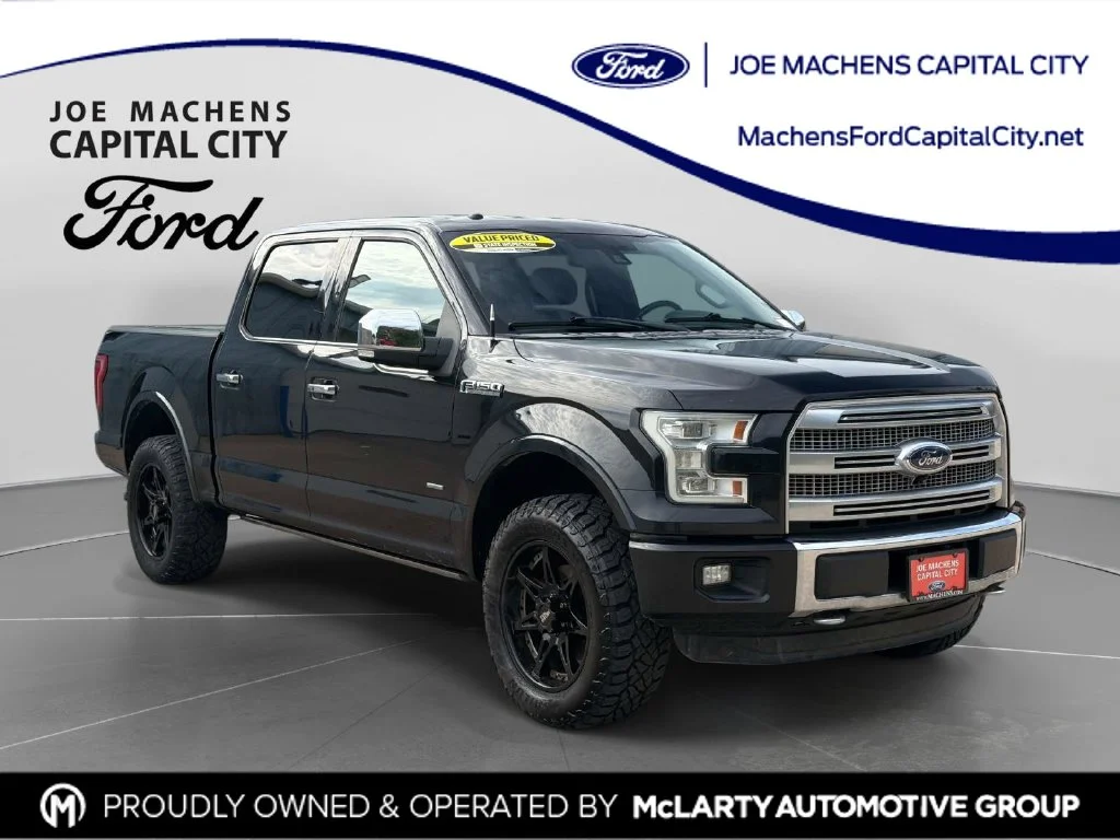 Used 2015 Tuxedo Black Metallic Ford Platinum image 1