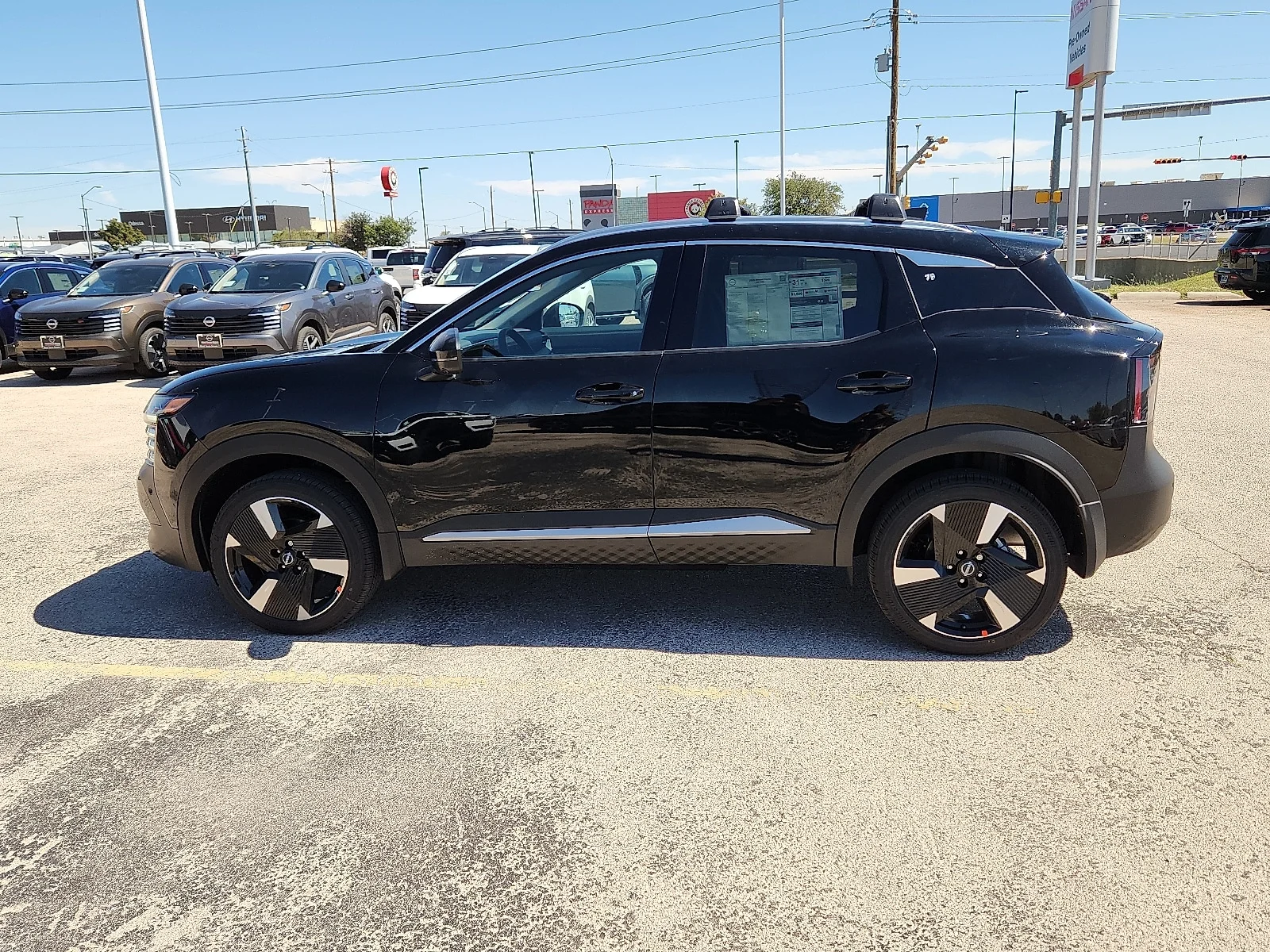 New 2026 KH3 Super Blac Nissan SR Front-Wheel Drive image 2