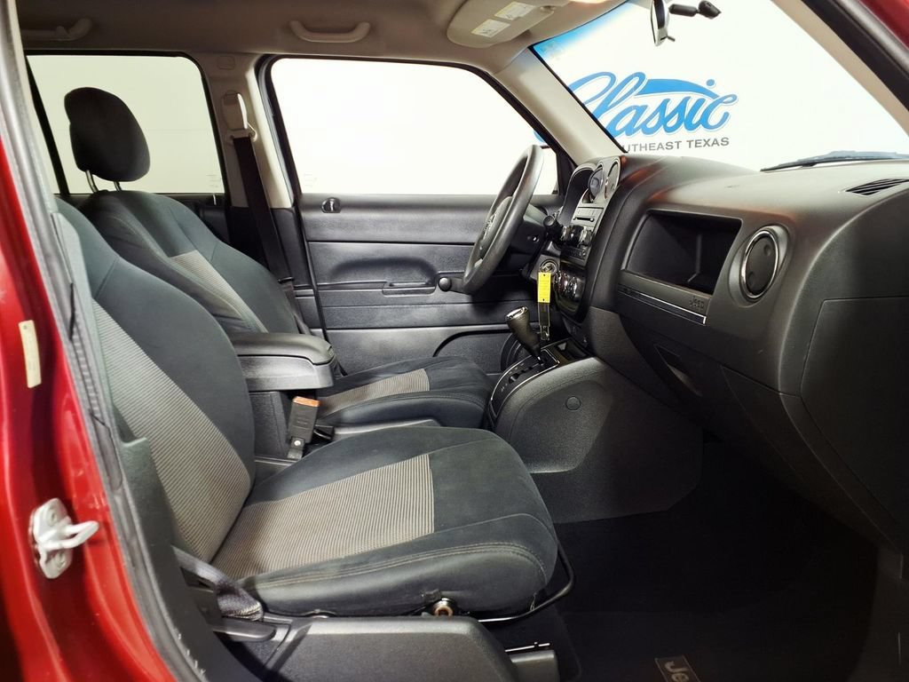 Used 2011 Deep Cherry Red Jeep Sport image 13