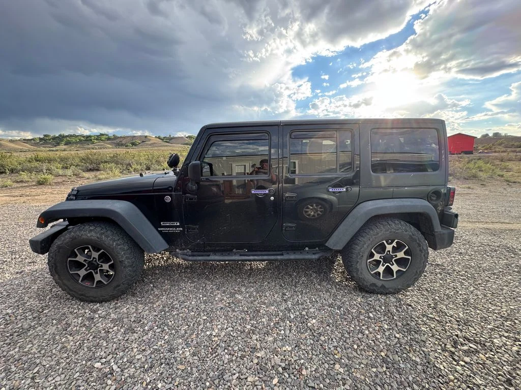 Used 2014 Black Clearcoat Jeep Unlimited Sport image 24