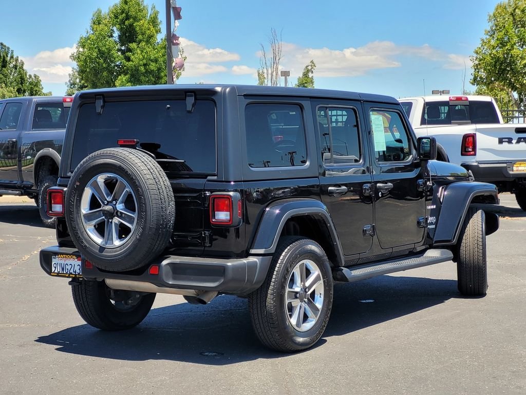 Used 2022 Black Jeep Unlimited Sahara image 4