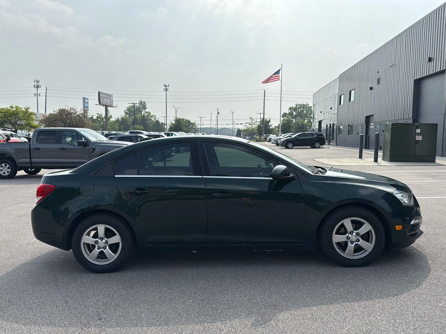 Used 2015 RAINFOREST GREEN METALLIC Chevrolet LT image 2