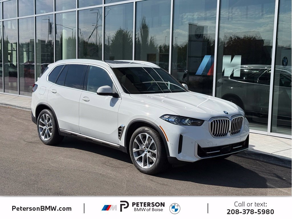 New 2026 Alpine White BMW xDrive50e image 7