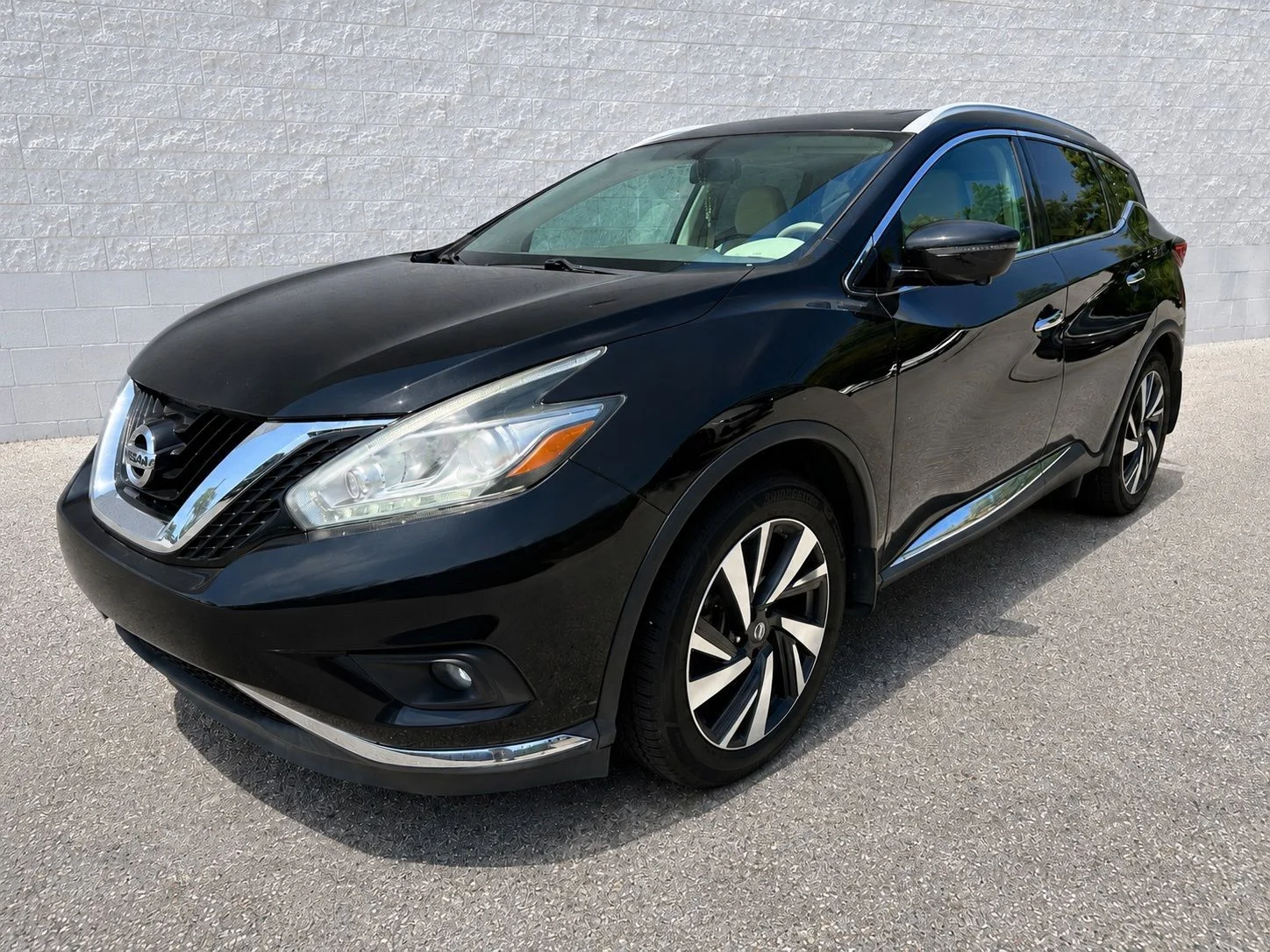 Used 2017 Magnetic Black Metallic Nissan Platinum image 1