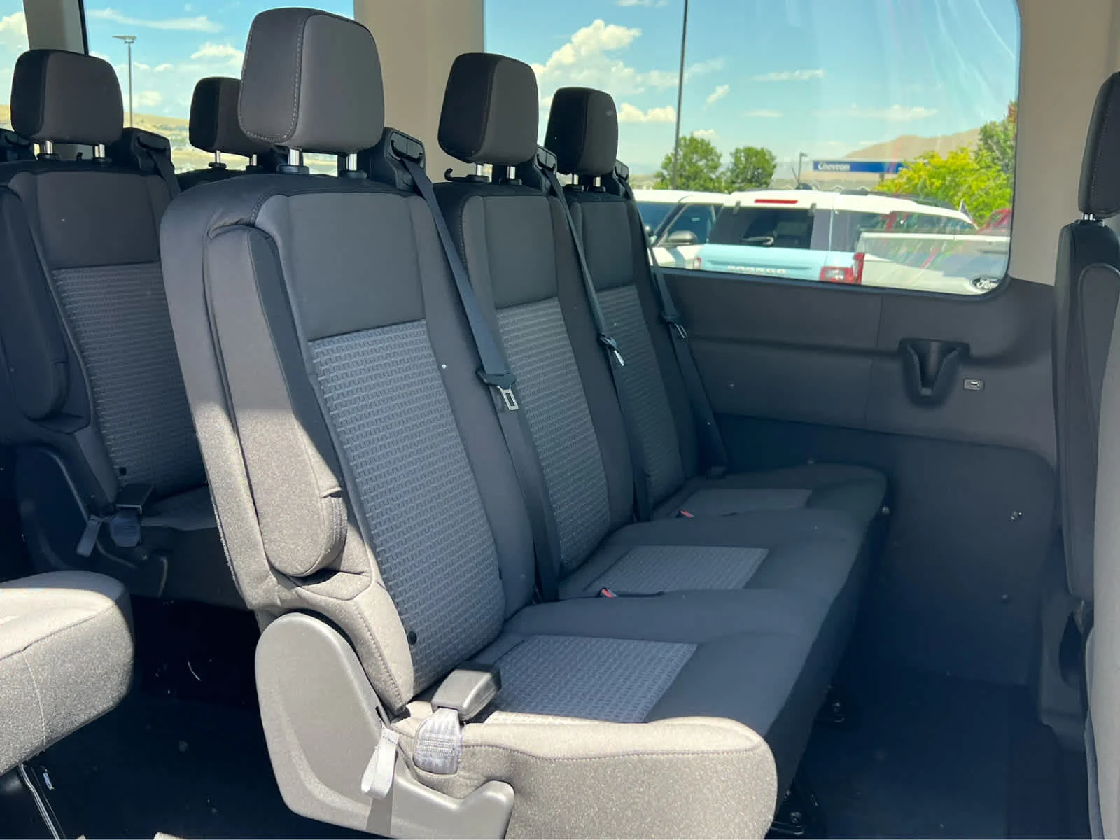 New 2026 Ingot Silver Metallic Ford Passenger Van XLT image 21
