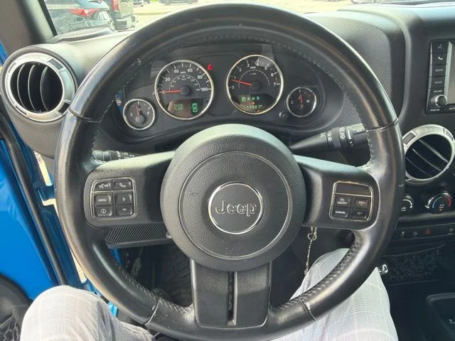 Used 2016 Blue Jeep Unlimited Sahara image 14