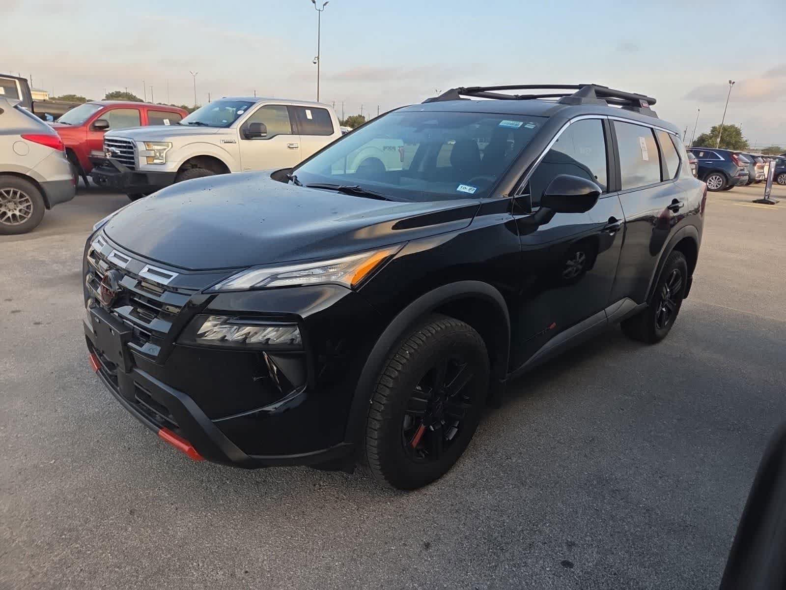Used 2026 Super Black Nissan Rock Creek image 2