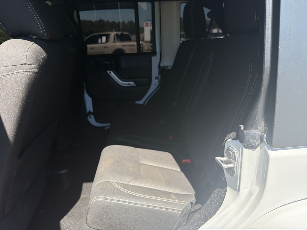 Used 2016 White Jeep Unlimited Sahara image 22