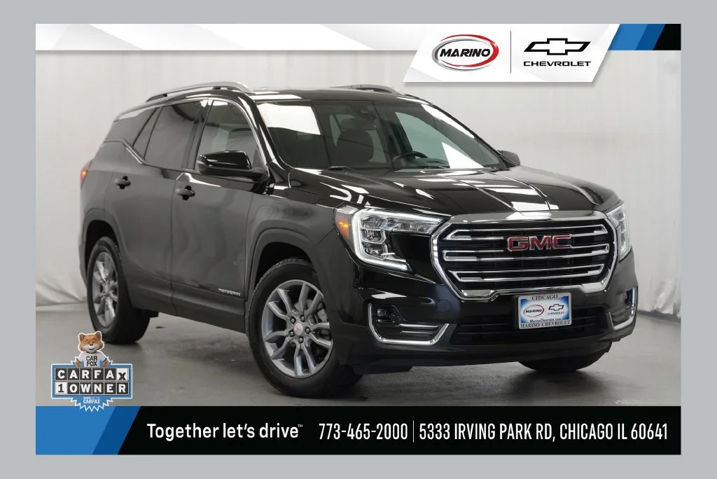 Used 2023 EBONY TWILIGHT METALLIC GMC SLT image 1