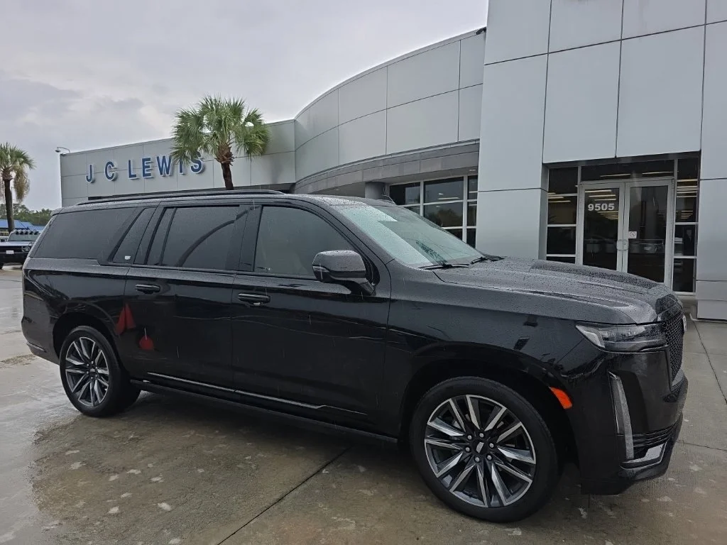 Used 2023 Black Raven Cadillac Sport image 1