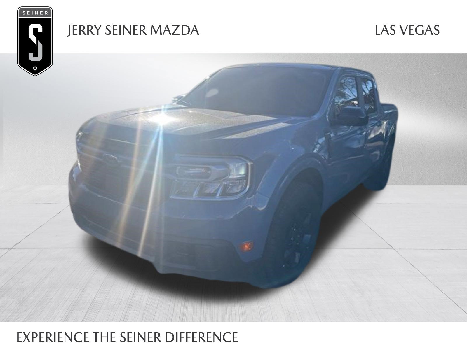 Used 2024 Azure Gray Metallic Ford LARIAT image 1
