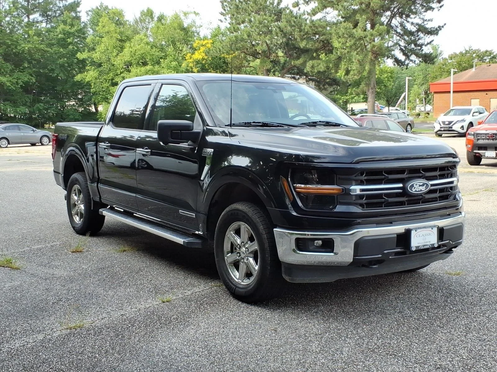 Used 2024 Agate Black Metallic Ford XLT image 5