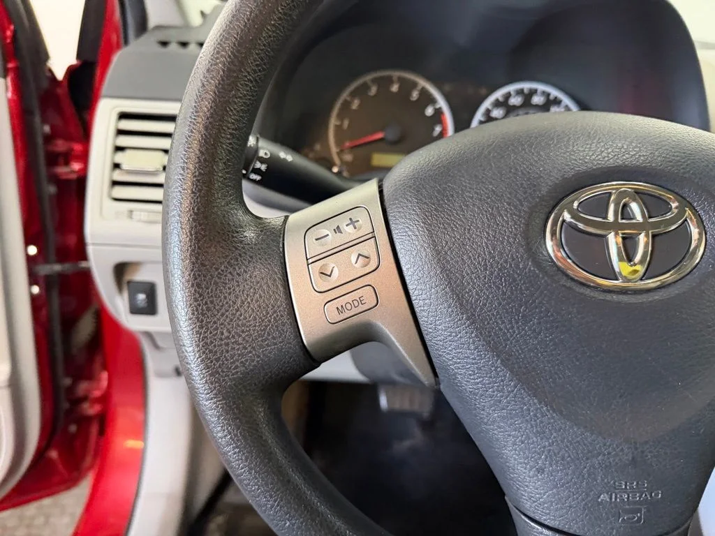 Used 2012 Barcelona Red Metallic Toyota LE image 12
