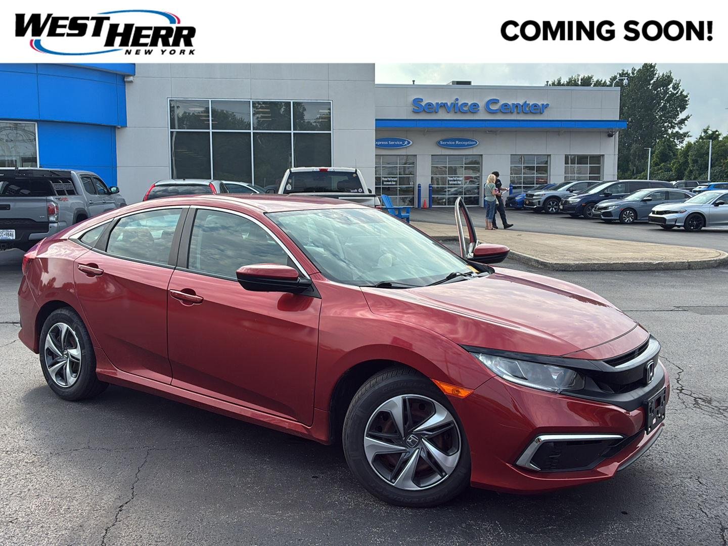 Used 2021 Molten Lava Pearl Honda LX image 1
