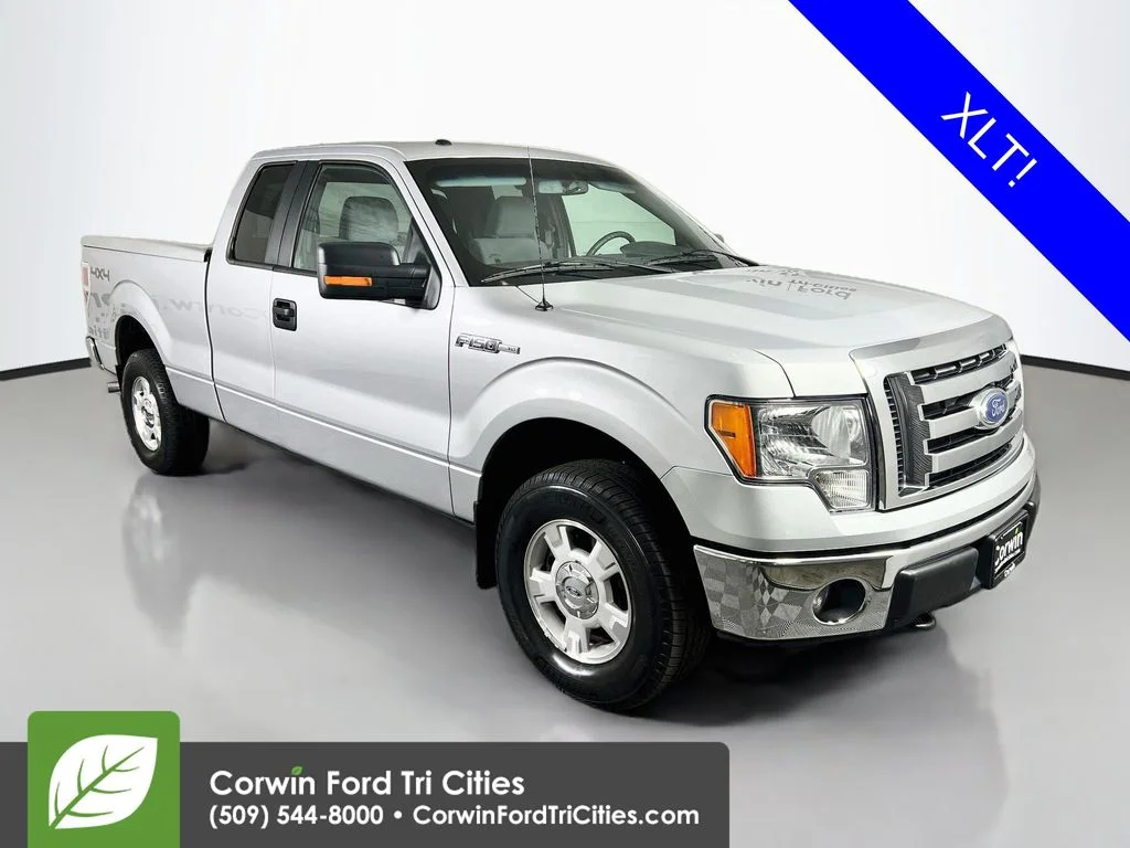 Used 2011 Ingot Silver Ford XLT image 1