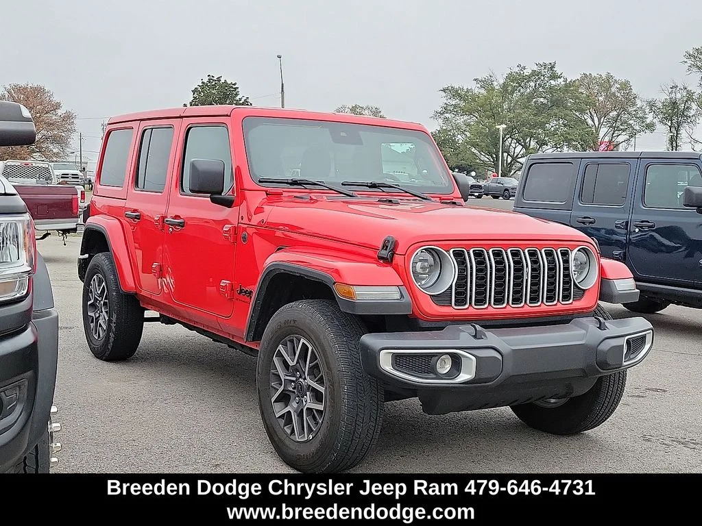 Used 2025 Red Jeep Sahara image 1