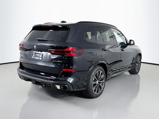New 2026 Black Sapphire Metallic BMW xDrive50e image 7