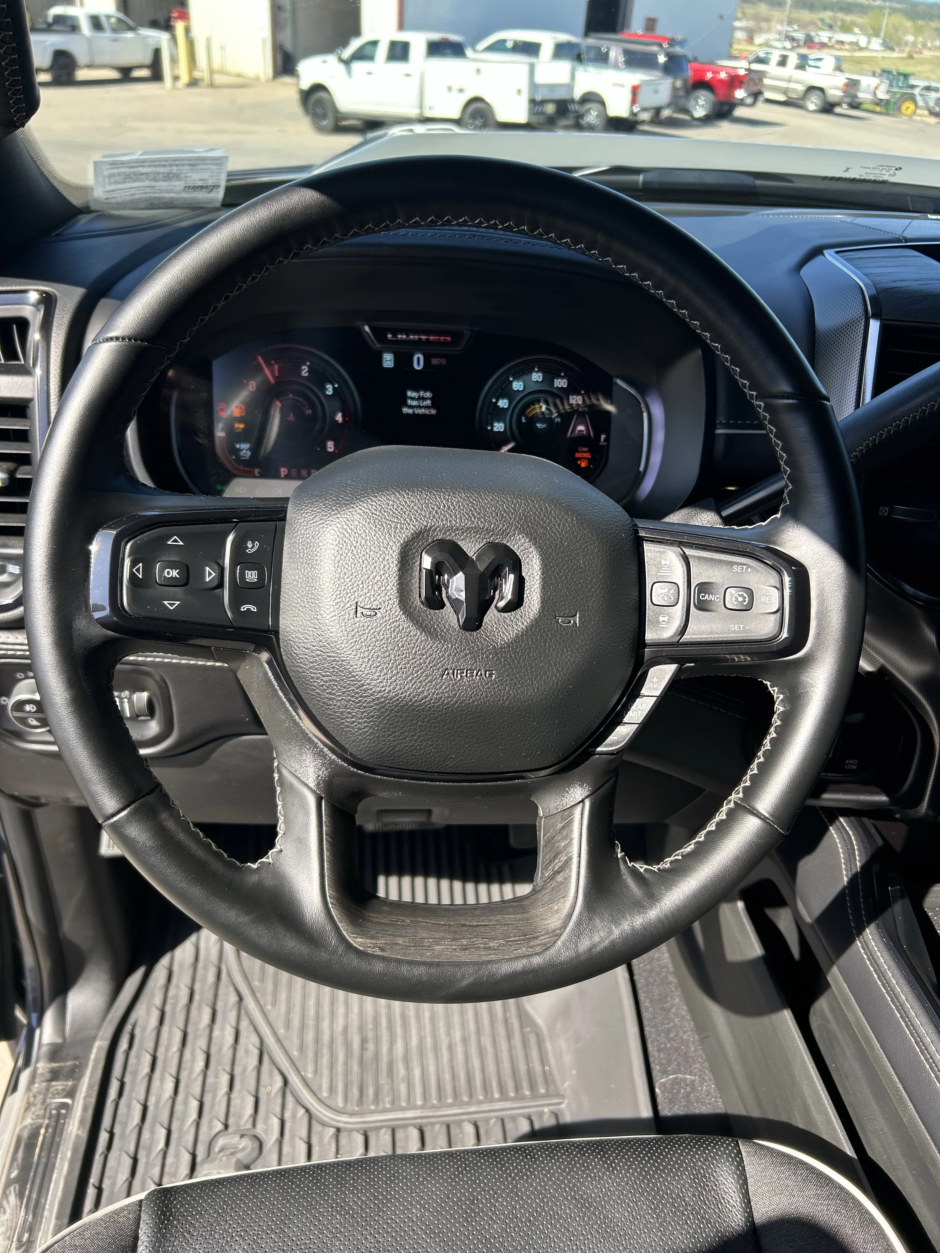 Used 2025 Ceramic Gray Clearcoat Ram Limited image 15