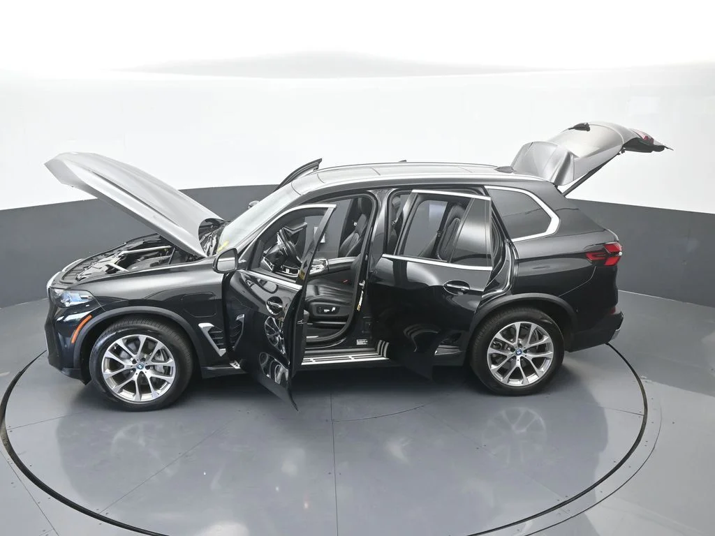 Used 2025 Black Sapphire Metallic BMW xDrive50e image 71