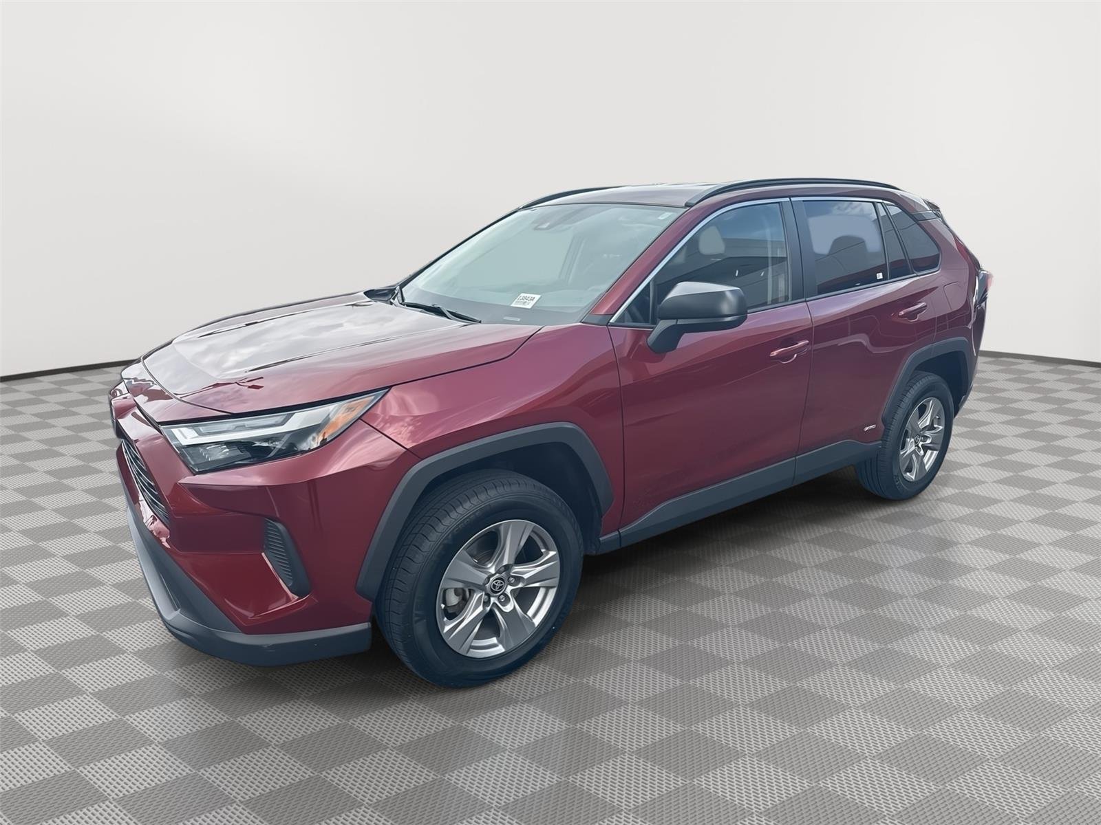 Used 2024 Ruby Flare Pearl Toyota Hybrid LE image 1