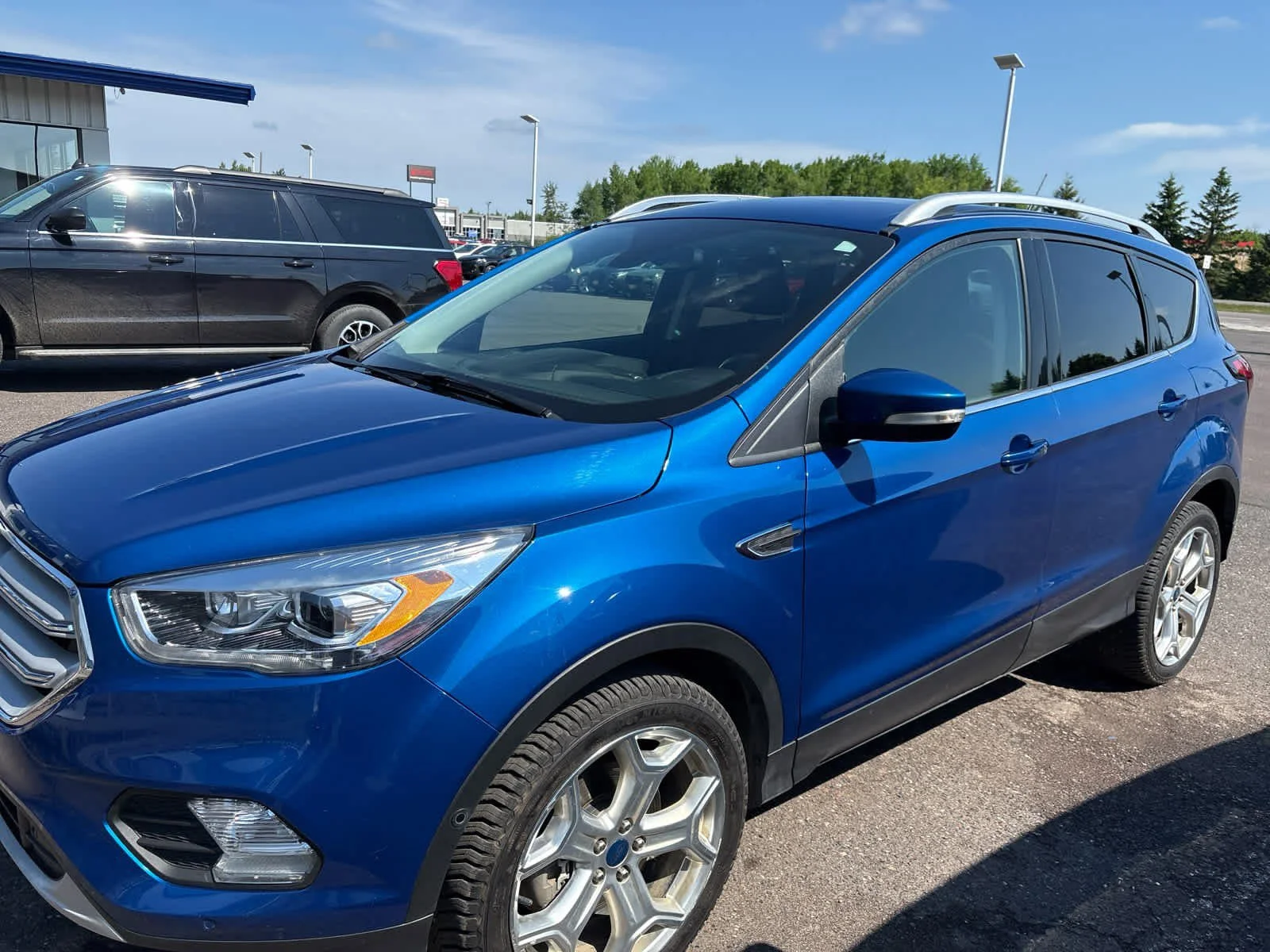 Used 2019 Lightning Blue Metallic Ford Titanium image 2