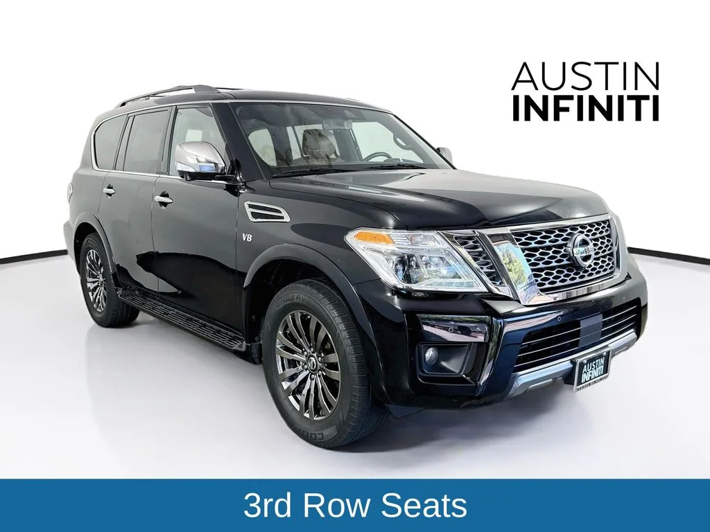 Used 2019 Black Nissan Platinum image 1