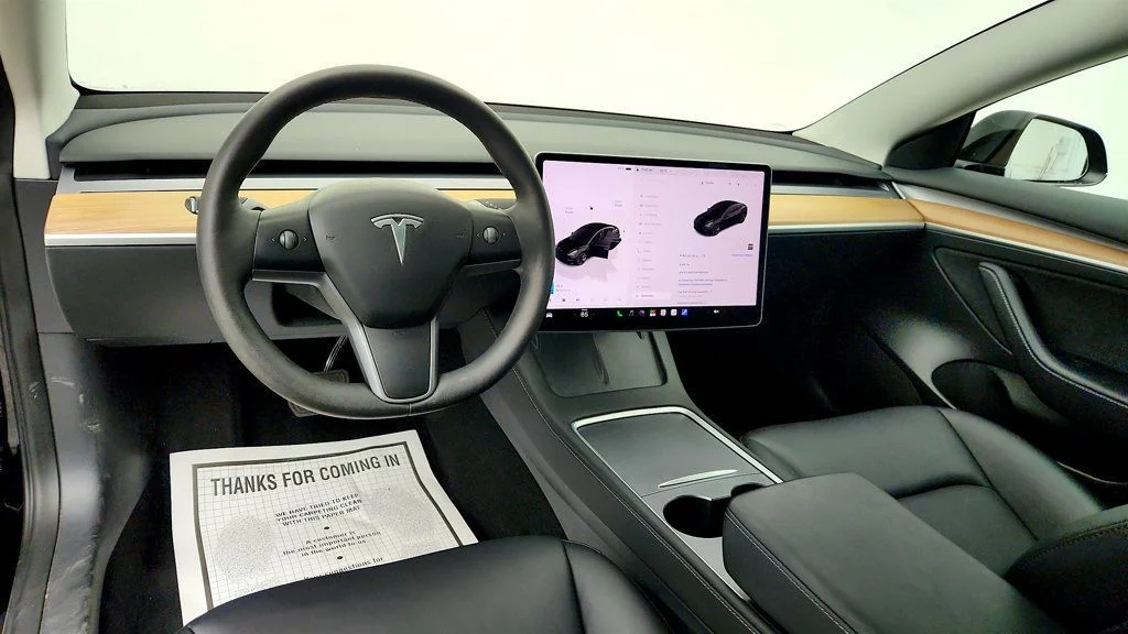 Used 2023 Solid Black Tesla RWD image 13