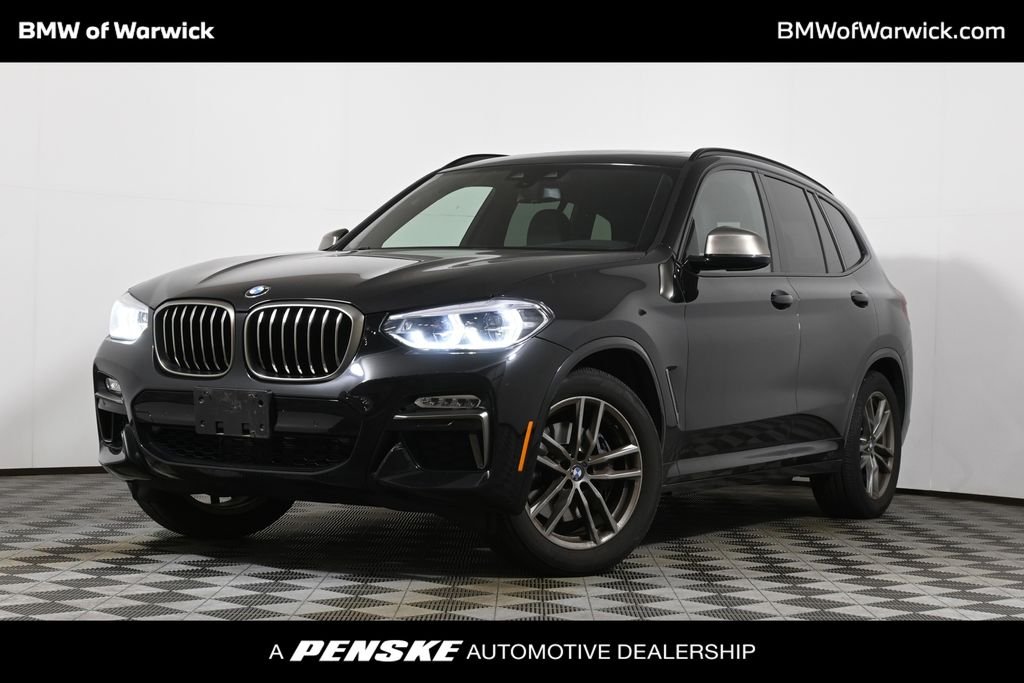 Used 2019 Black Sapphire Metallic BMW M40i image 1