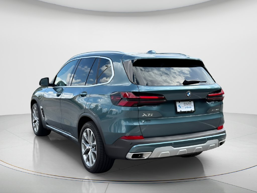 Certified Used 2024 Blue BMW xDrive40i image 7