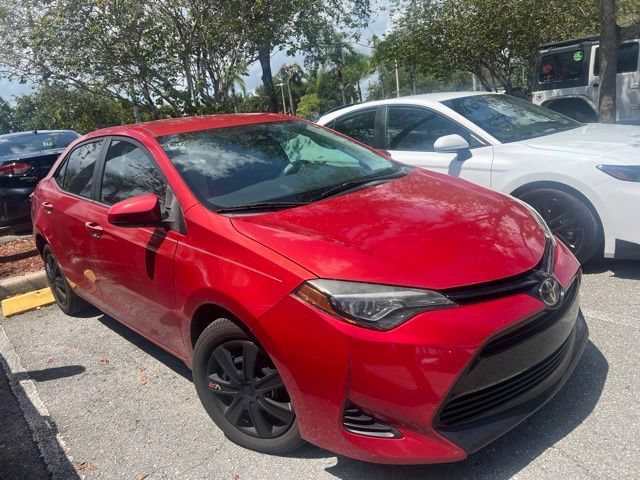 Used 2018 Barcelona Red Metallic Toyota LE image 9